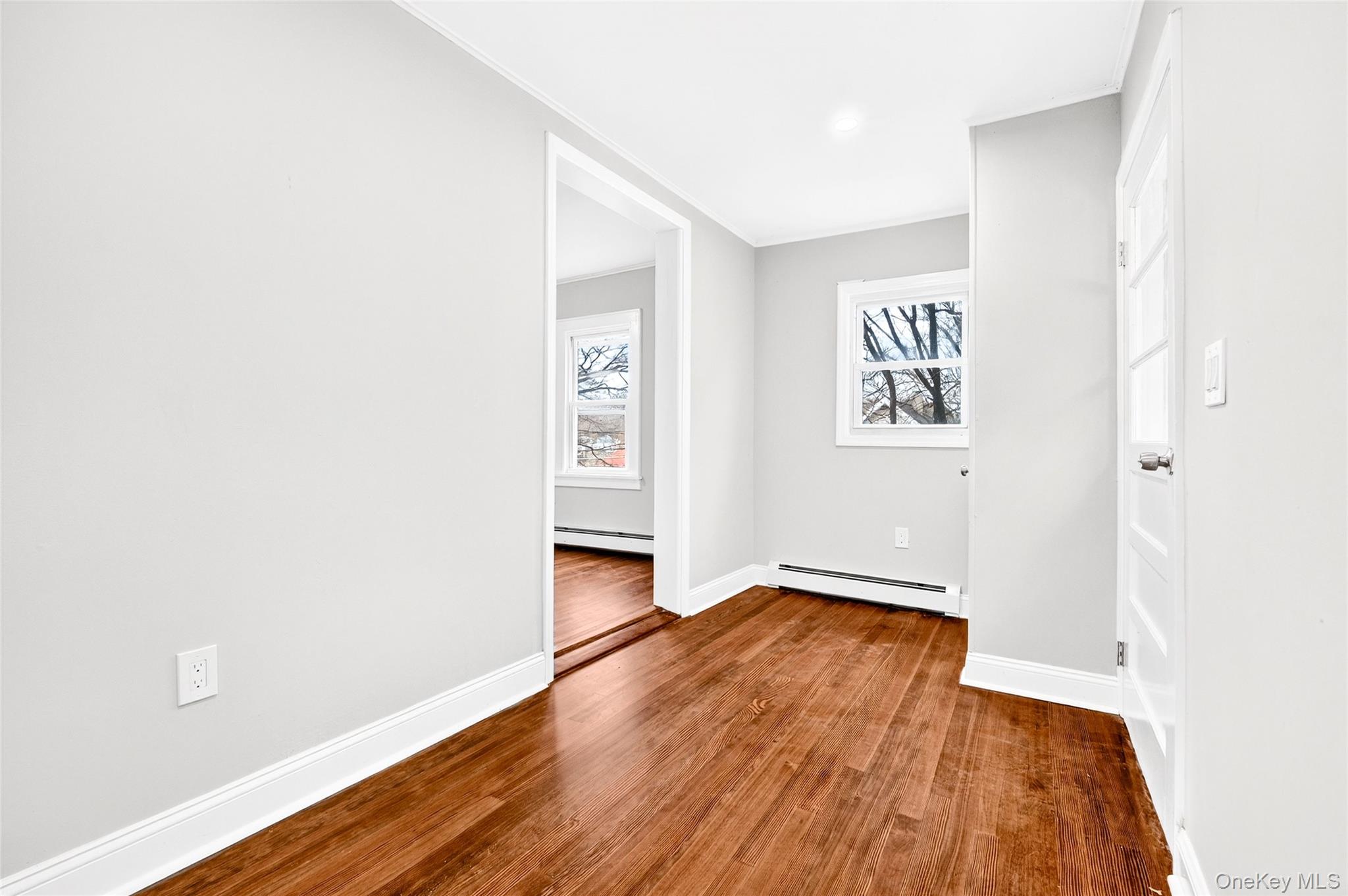 669 North Division Street Peekskill, NY 10566 - Photo 12 of 48 a view of an empty room with wooden floor