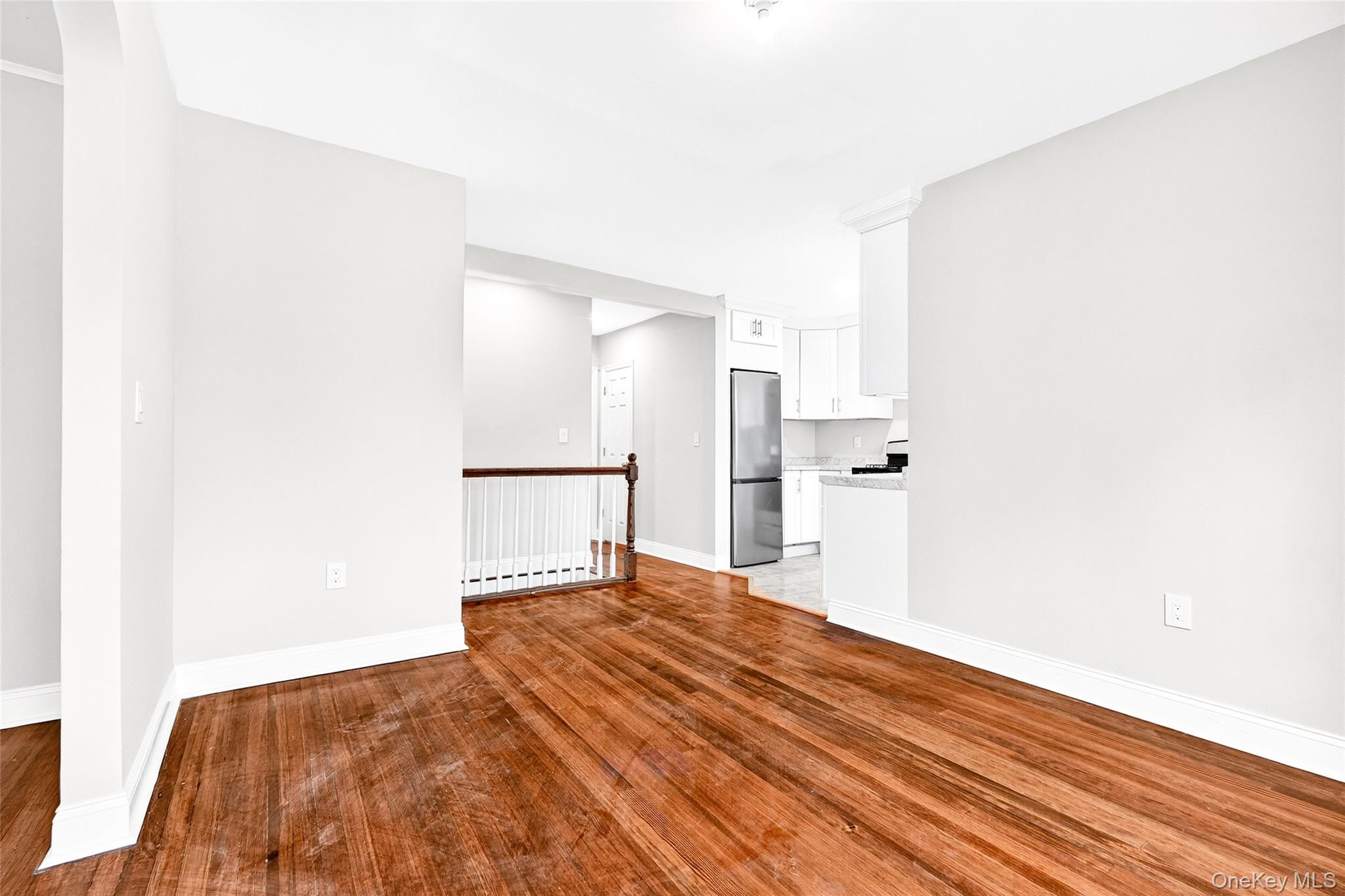 669 North Division Street Peekskill, NY 10566 - Photo 20 of 48 a bedroom with a bed and a painting on the wall