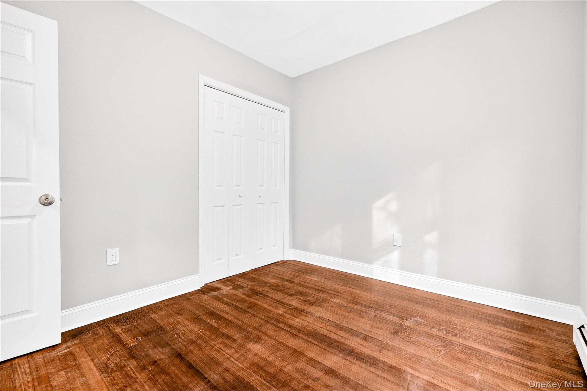 669 North Division Street Peekskill, NY 10566 - Photo 29 of 48 a view of empty room with wooden floor