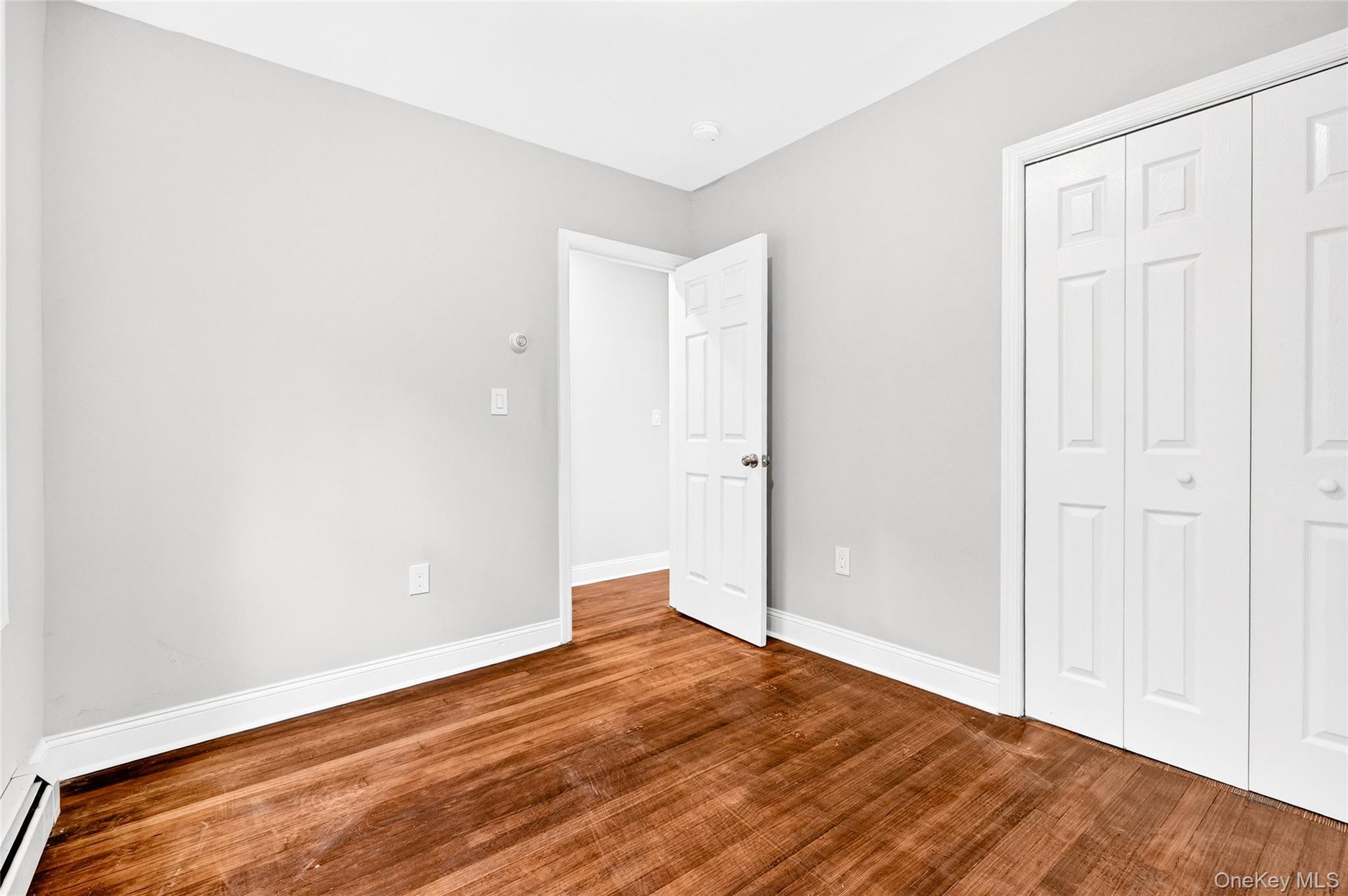 669 North Division Street Peekskill, NY 10566 - Photo 30 of 48 an empty room with wooden floor