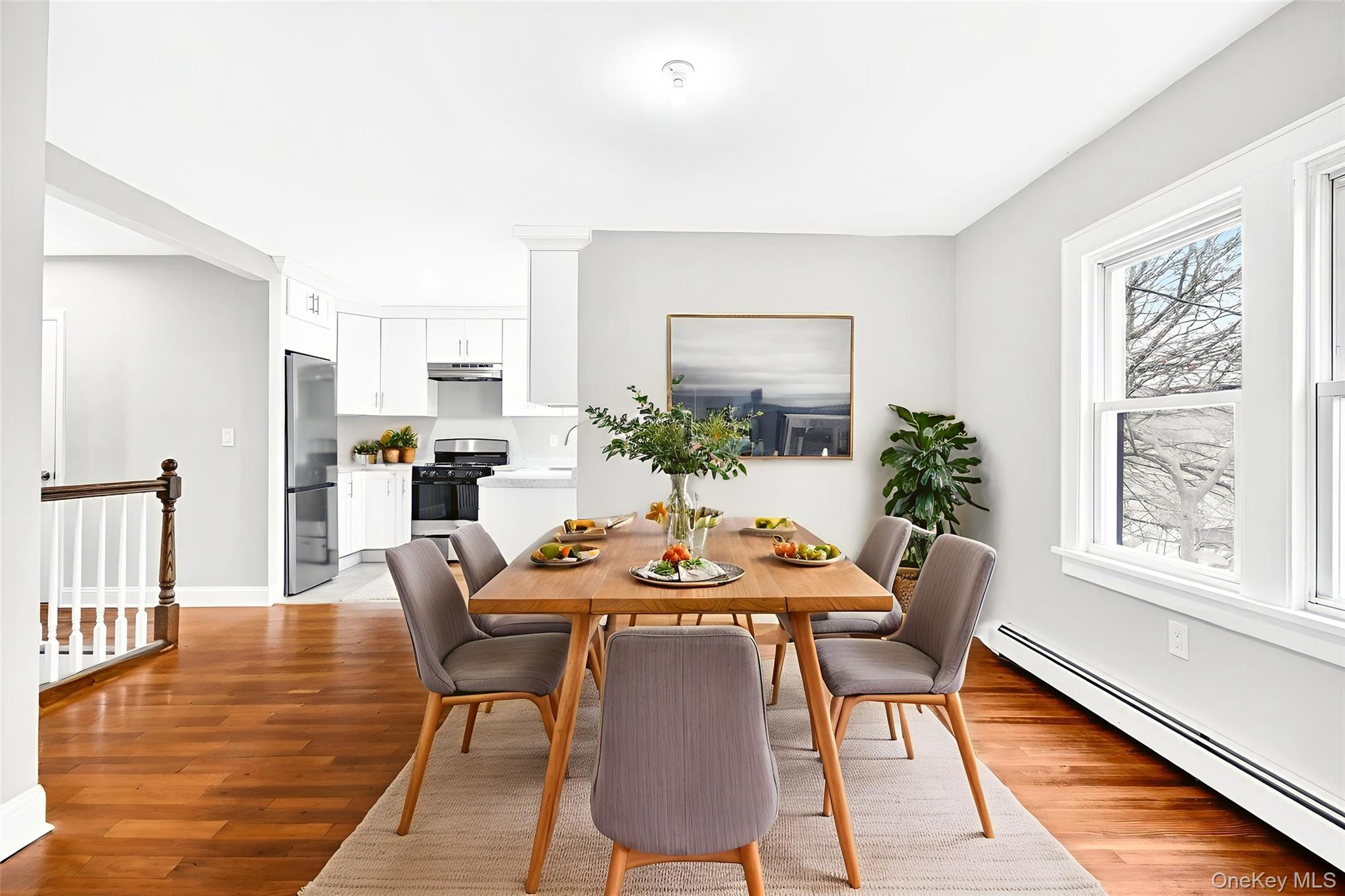 669 North Division Street Peekskill, NY 10566 - Photo 3 of 48 a dining room with furniture and wooden floor