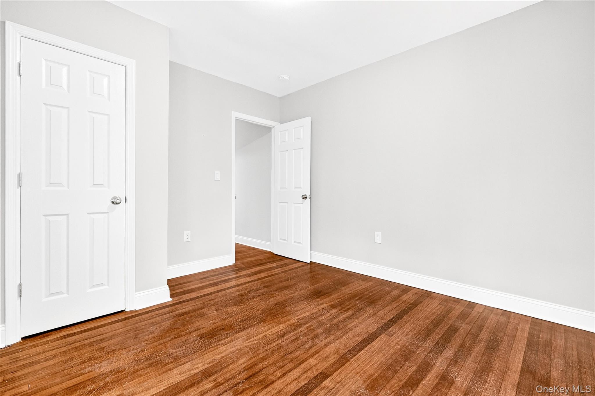 669 North Division Street Peekskill, NY 10566 - Photo 35 of 48 a view of an empty room with wooden floor