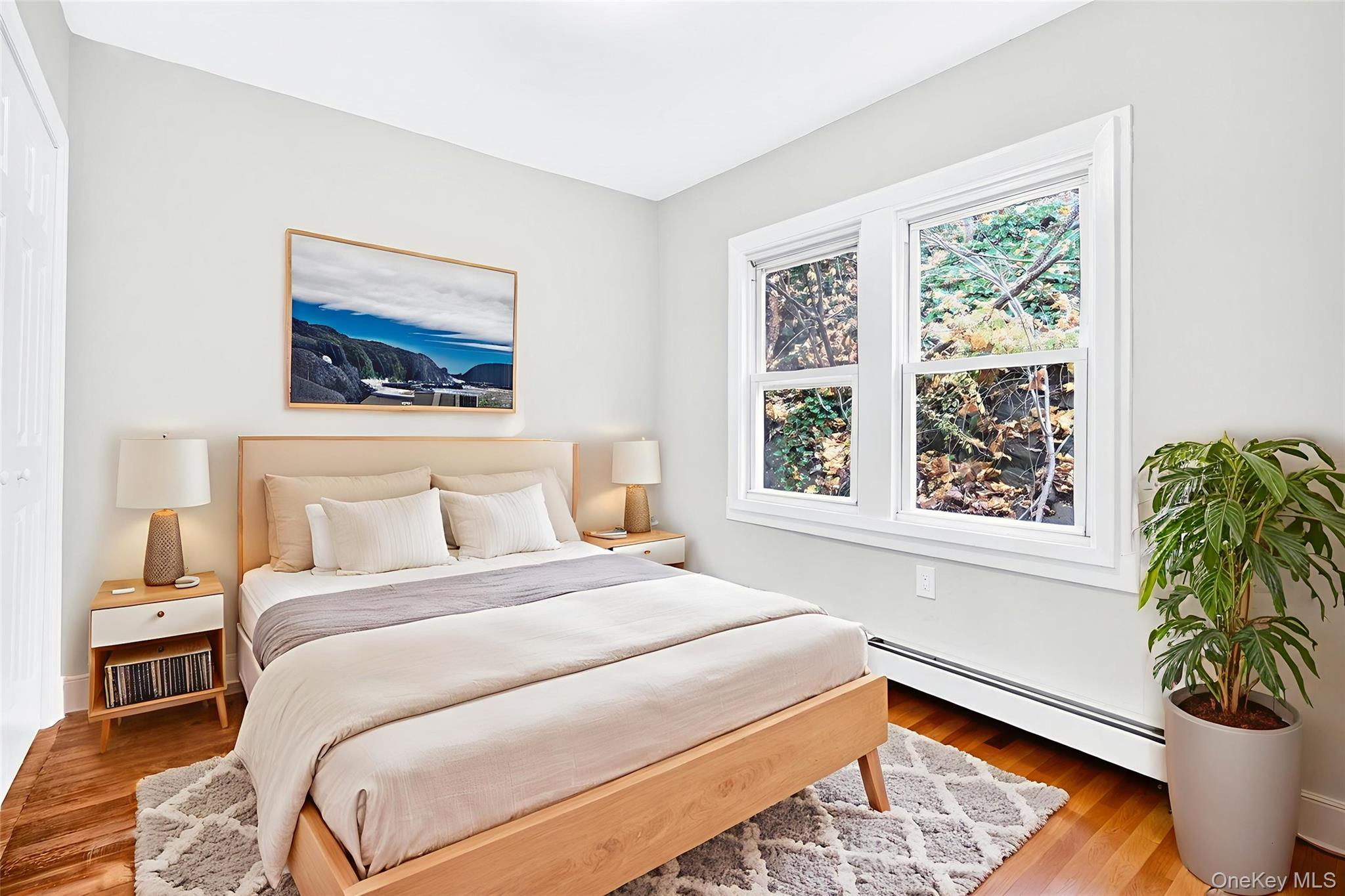 669 North Division Street Peekskill, NY 10566 - Photo 4 of 48 a bedroom with bed and a window