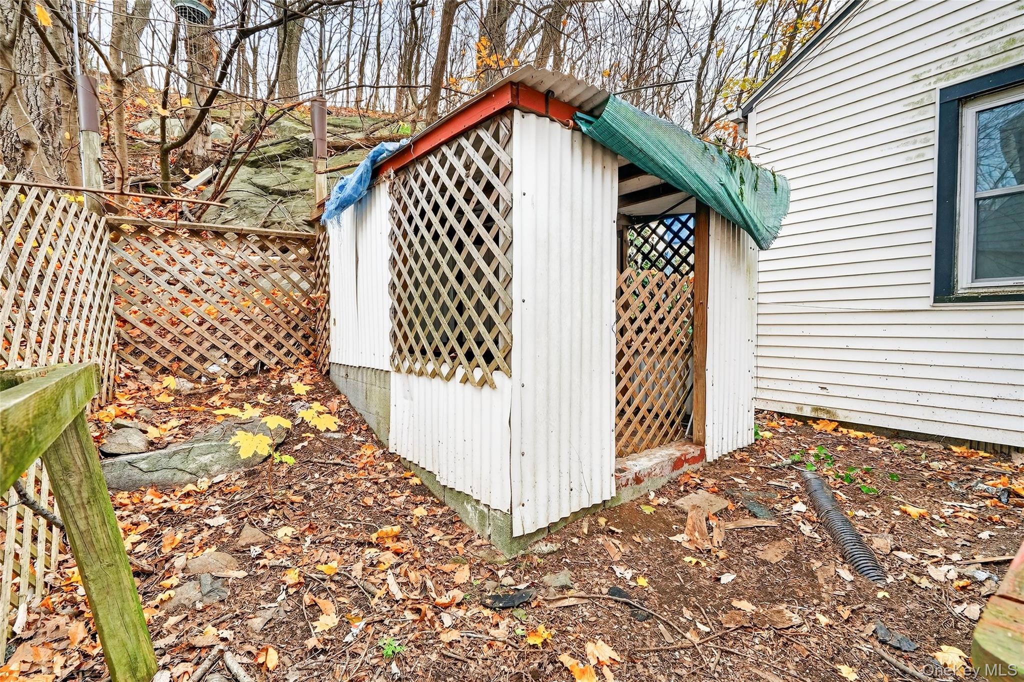 669 North Division Street Peekskill, NY 10566 - Photo 48 of 48 a view of a house with wooden fence
