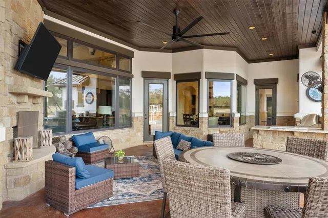 a living room with furniture and flat screen tv