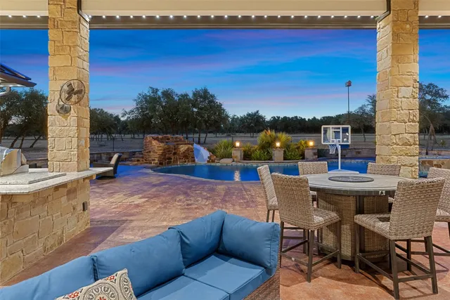 a view of a chairs and table in the terrace