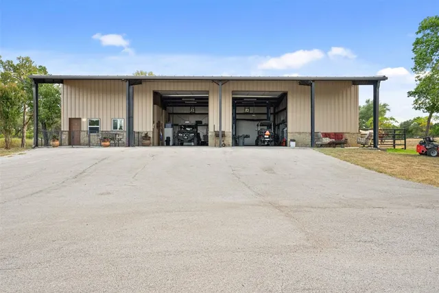 a view of a house with a garage