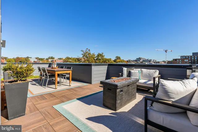 a view of a terrace with furniture