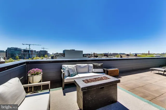 a view of a chairs and table on the terrace