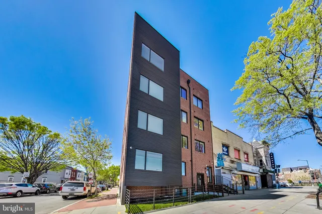 a view of a building and a street view