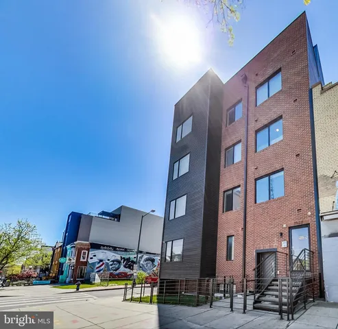 a car parked in front of a building