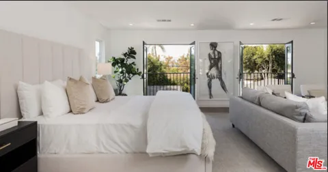 a view of swimming pool with lounge chair