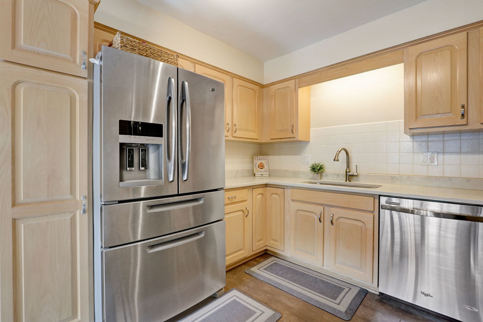 1514 Applegate Drive Naperville, IL 60565 - Photo 13 of 51 a kitchen with stainless steel appliances a refrigerator sink and cabinets