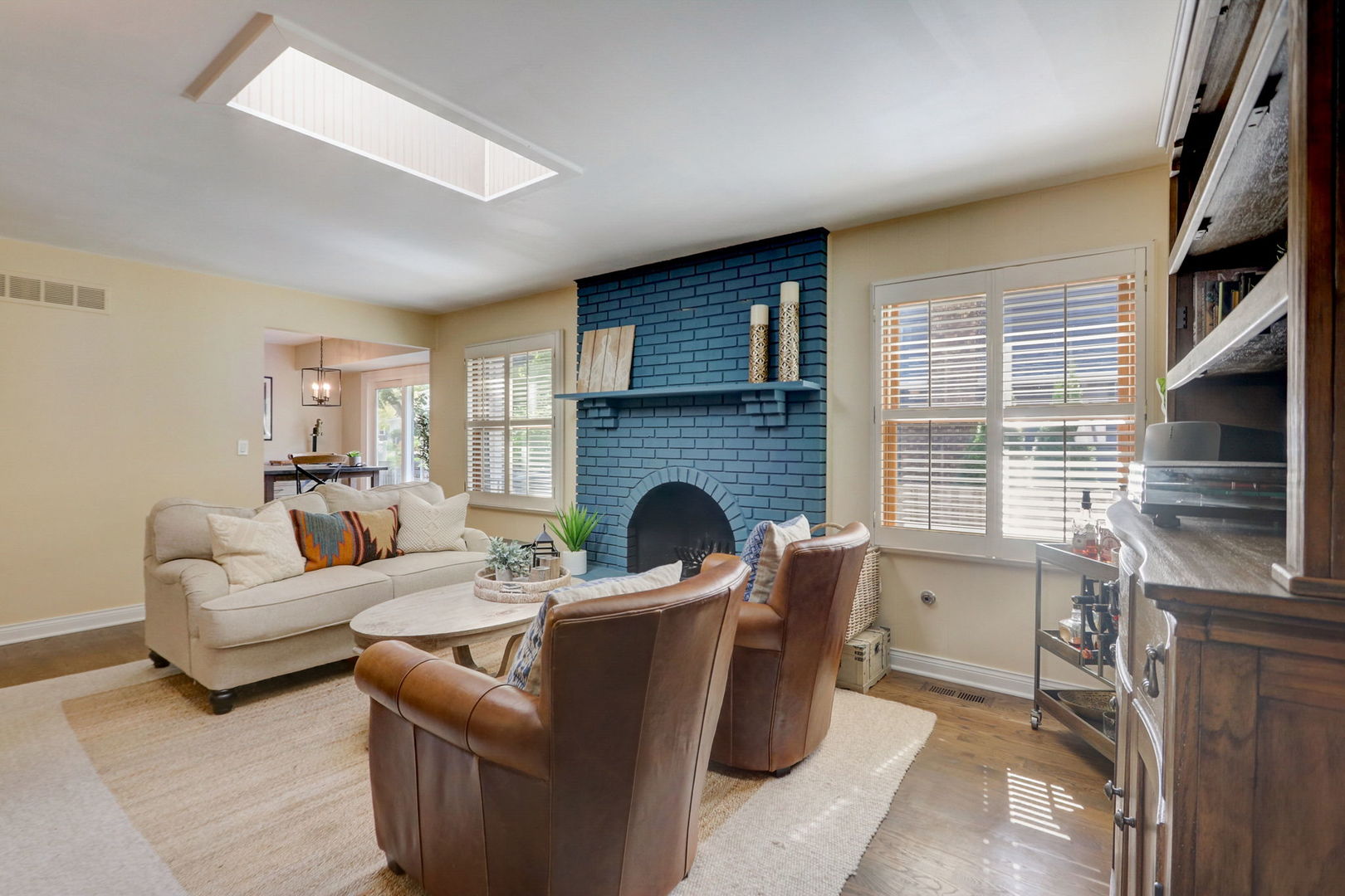 1514 Applegate Drive Naperville, IL 60565 - Photo 20 of 51 a living room with furniture a fireplace and a flat screen tv