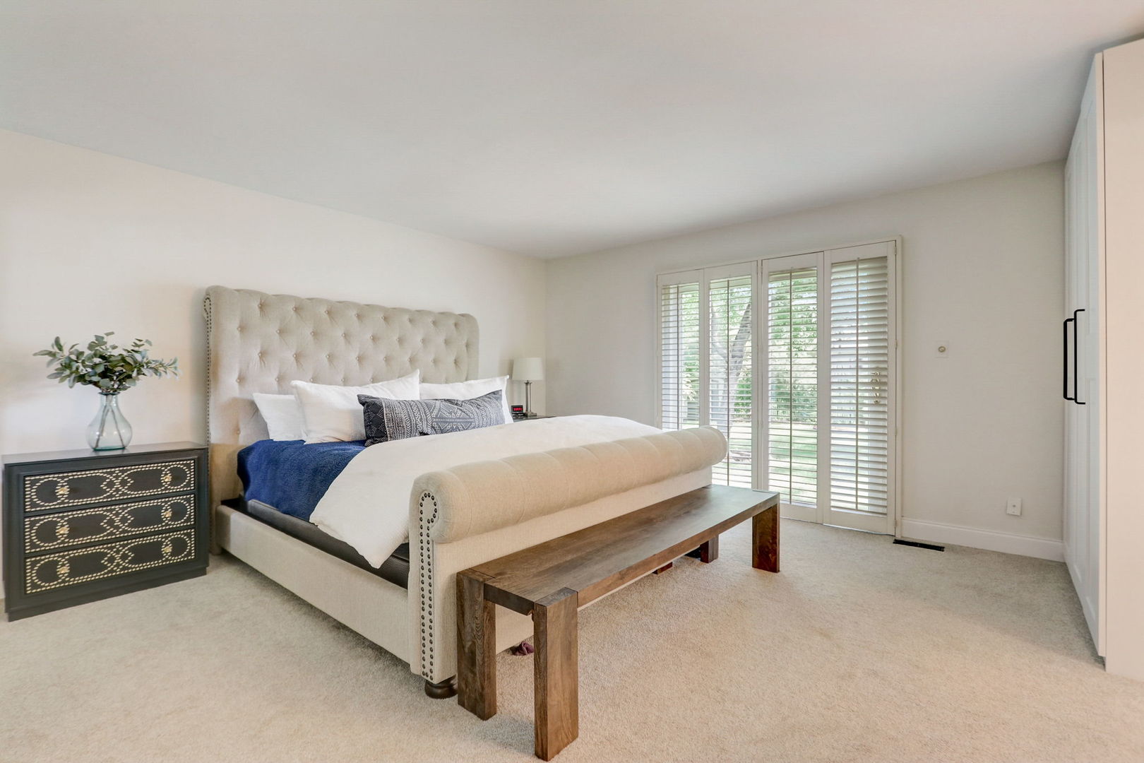 1514 Applegate Drive Naperville, IL 60565 - Photo 23 of 51 a bed sitting in a spacious bedroom next to a window and a larger closet
