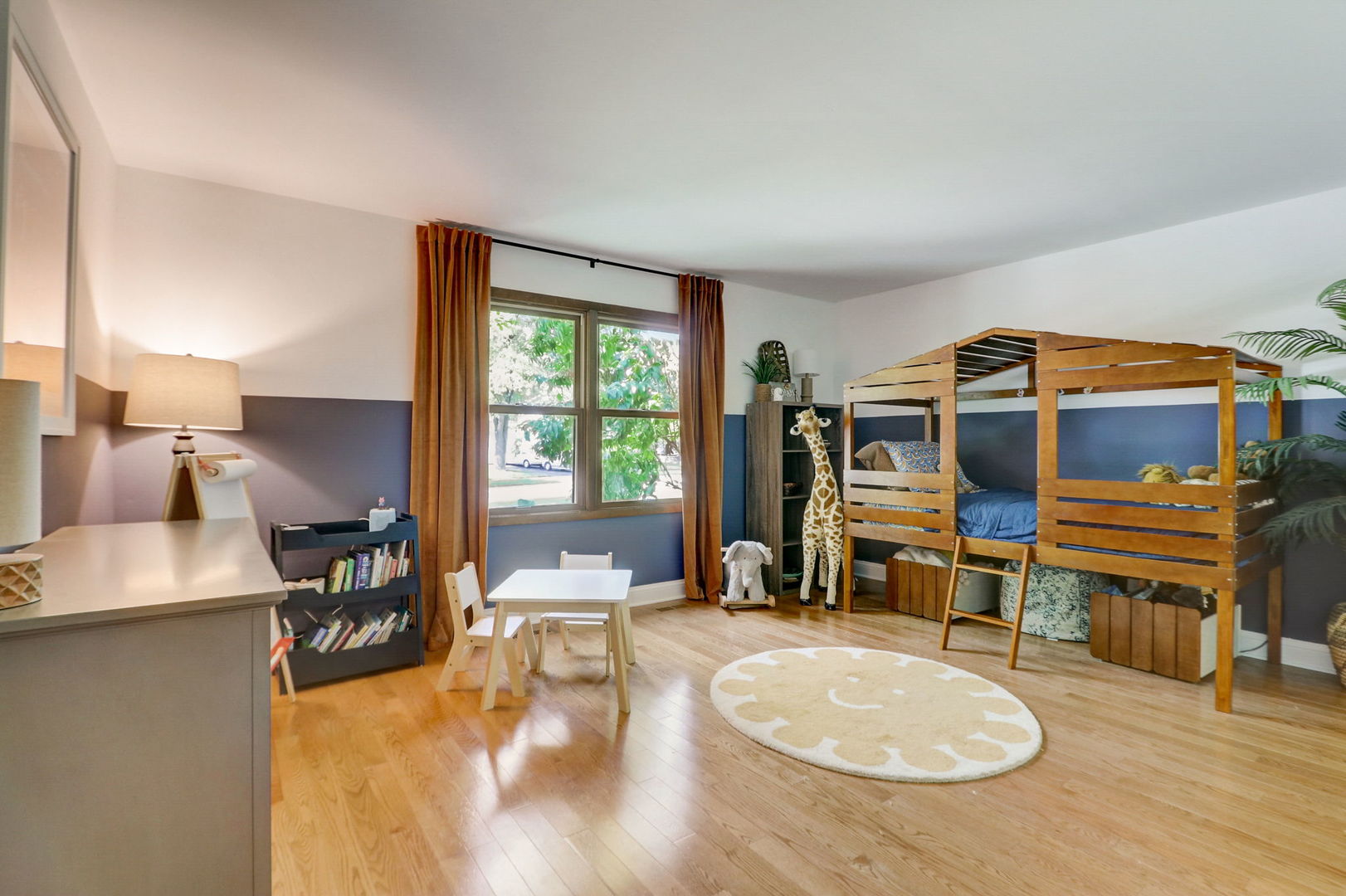 1514 Applegate Drive Naperville, IL 60565 - Photo 30 of 51 a living room with furniture and a flat screen tv