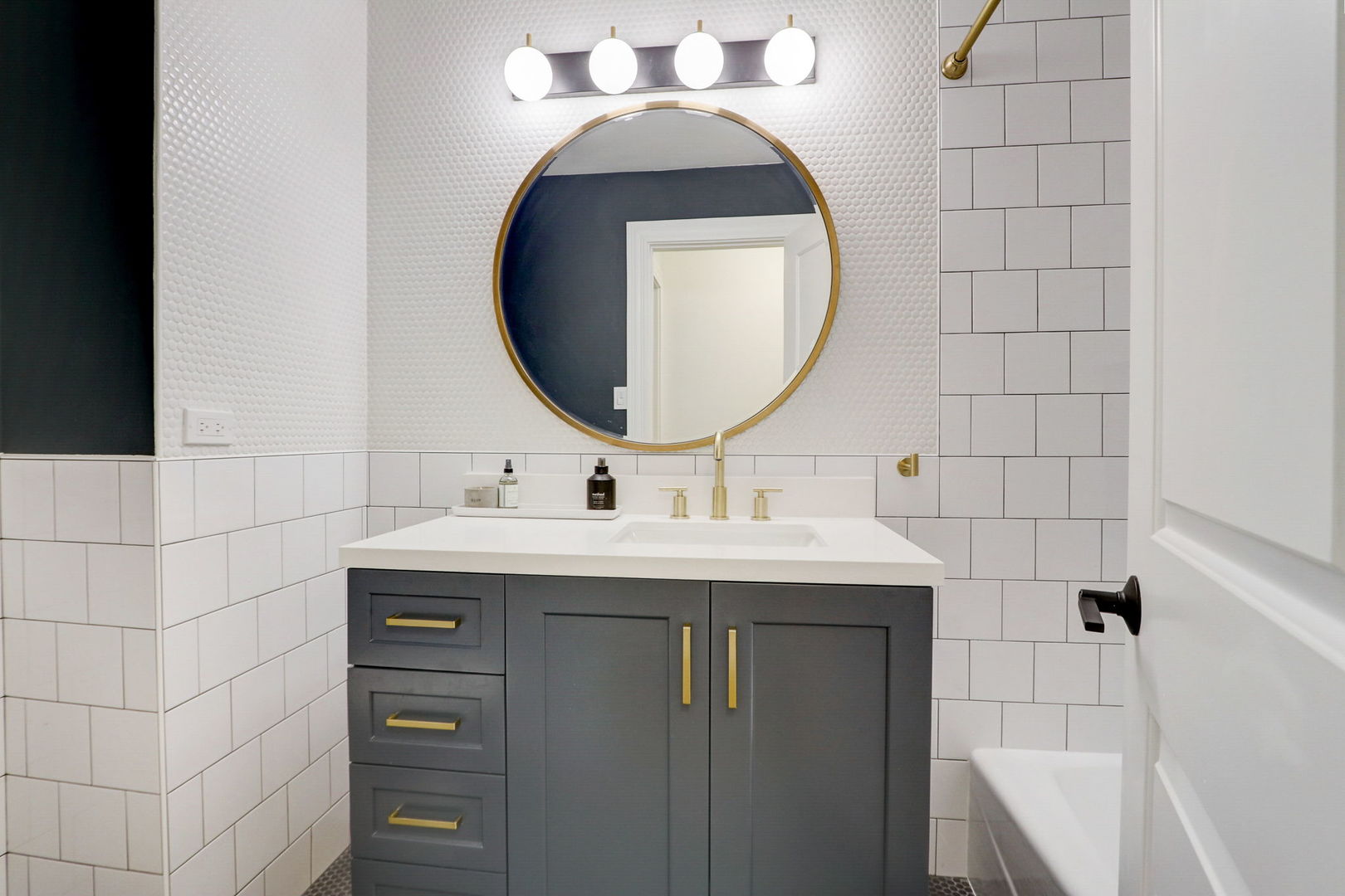 1514 Applegate Drive Naperville, IL 60565 - Photo 32 of 51 a bathroom with a sink and a mirror