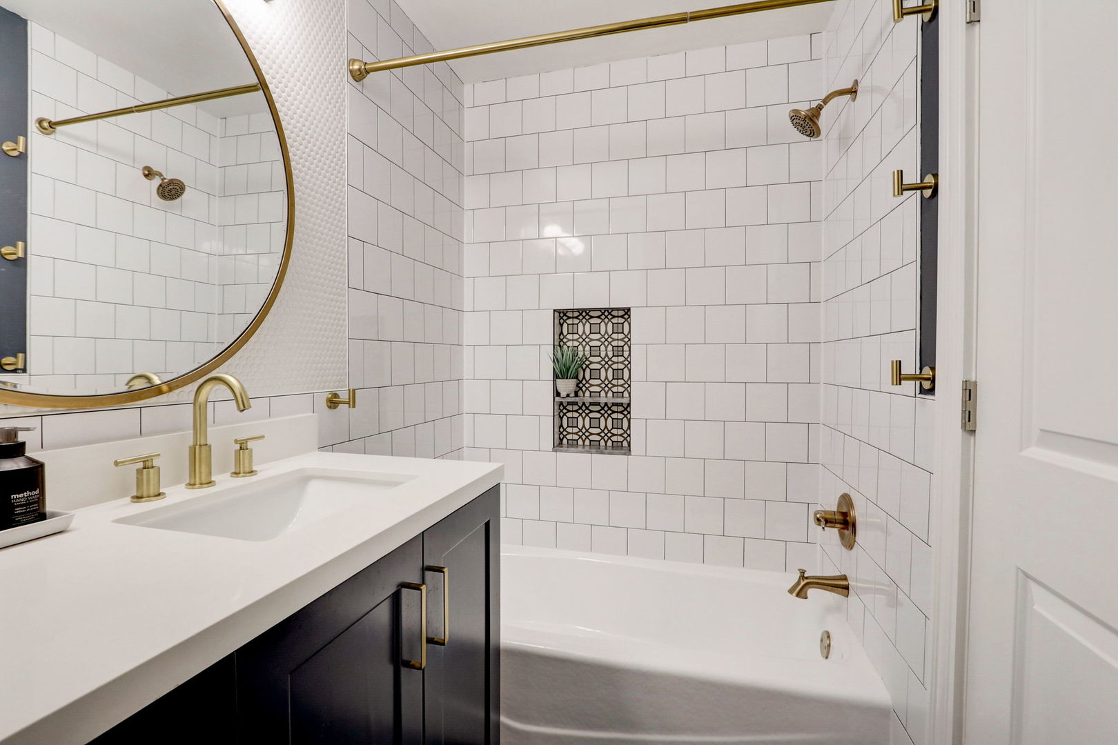 1514 Applegate Drive Naperville, IL 60565 - Photo 33 of 51 a bathroom with a sink and a bathtub