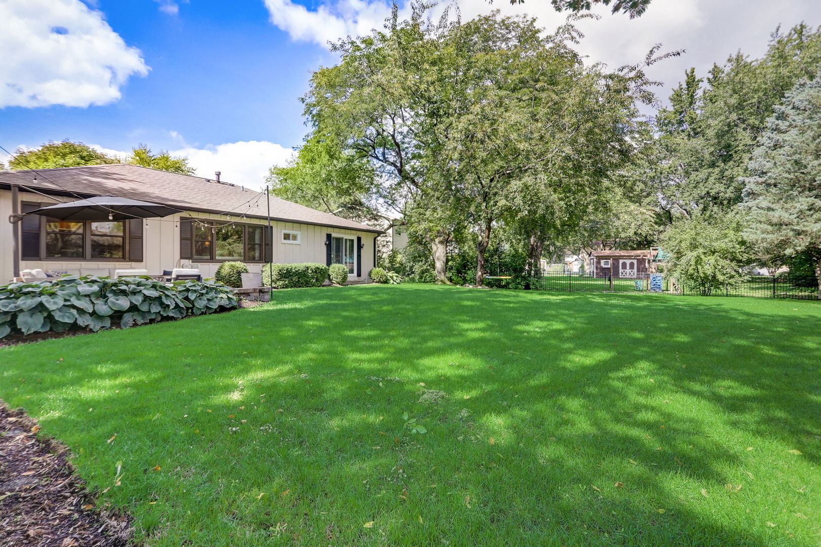 1514 Applegate Drive Naperville, IL 60565 - Photo 40 of 51 a front view of house with yard and green space