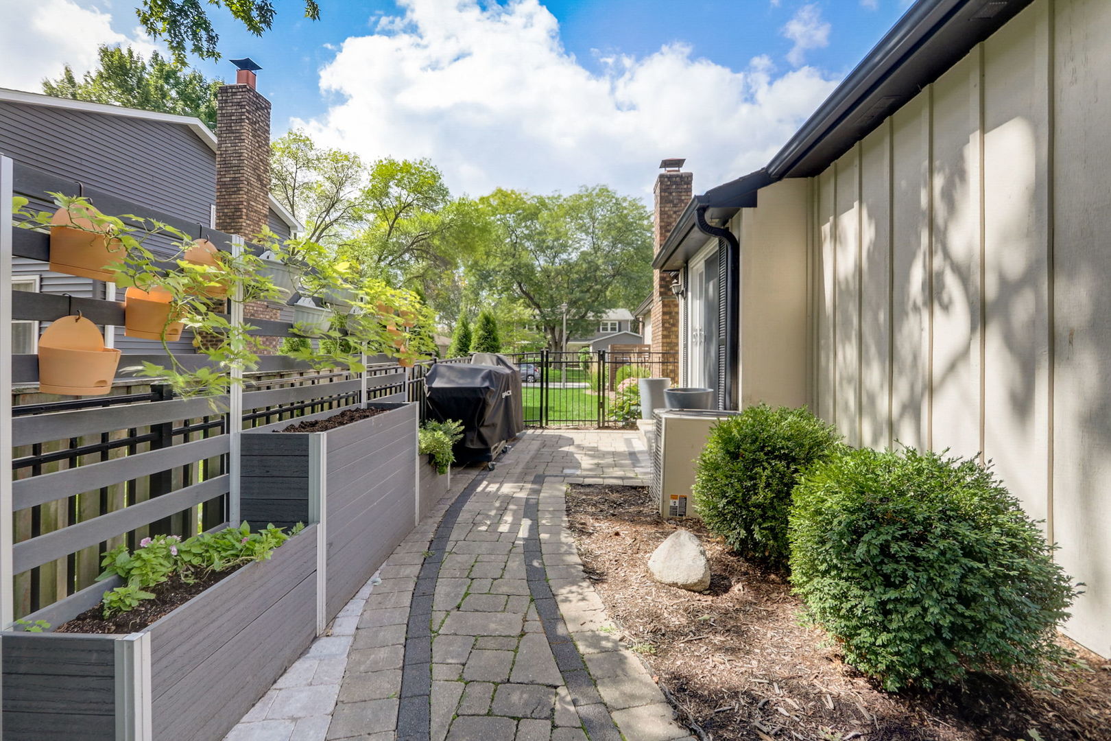 1514 Applegate Drive Naperville, IL 60565 - Photo 42 of 51 a front view of a house with garden