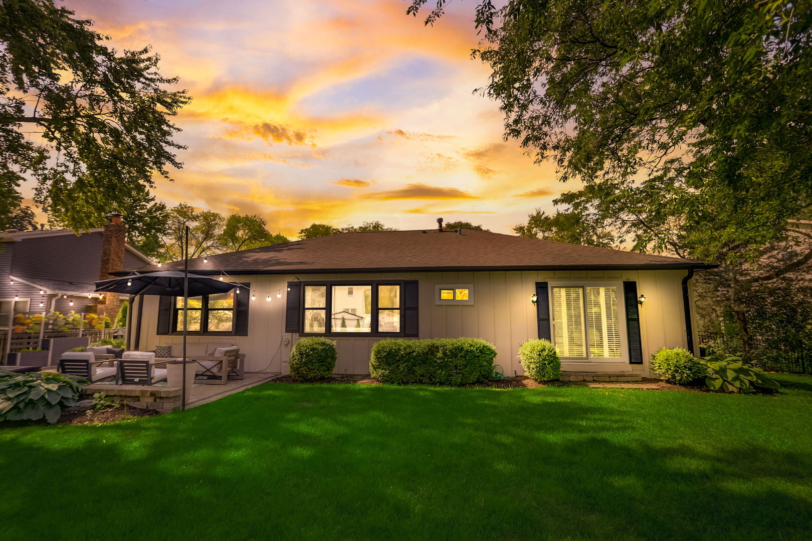 1514 Applegate Drive Naperville, IL 60565 - Photo 45 of 51 a front view of a house with a garden and yard