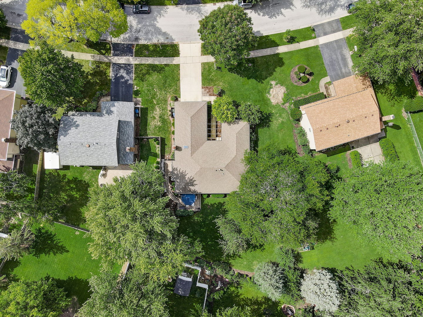 1514 Applegate Drive Naperville, IL 60565 - Photo 48 of 51 an aerial view of a house with swimming pool and garden