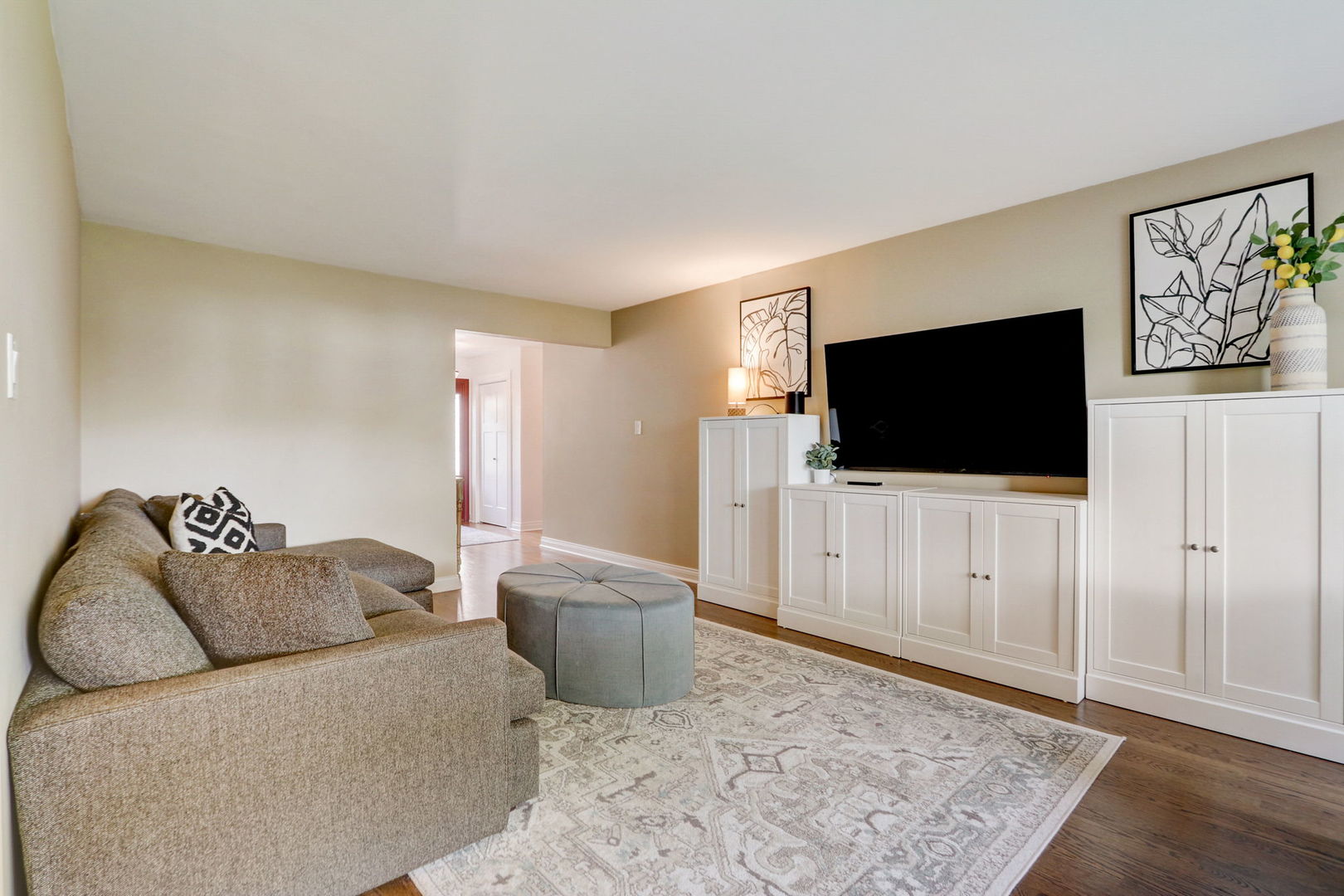 1514 Applegate Drive Naperville, IL 60565 - Photo 6 of 51 a living room with furniture and a flat screen tv