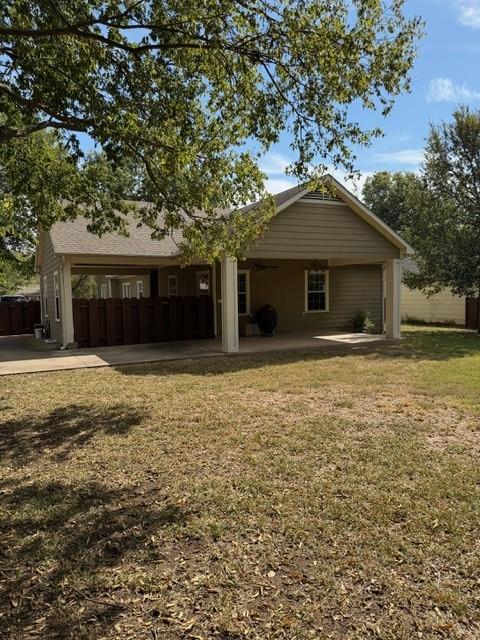 613 North Main Street Muenster, TX 76252 - Photo 17 of 24 a front view of a house with a yard