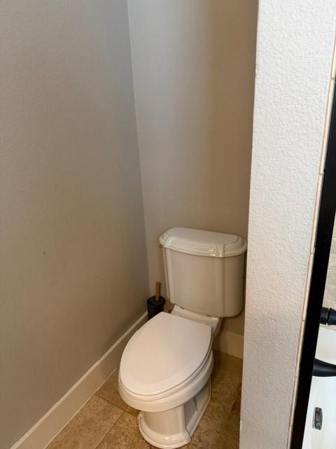 613 North Main Street Muenster, TX 76252 - Photo 6 of 24 a white toilet sitting next to a white wall
