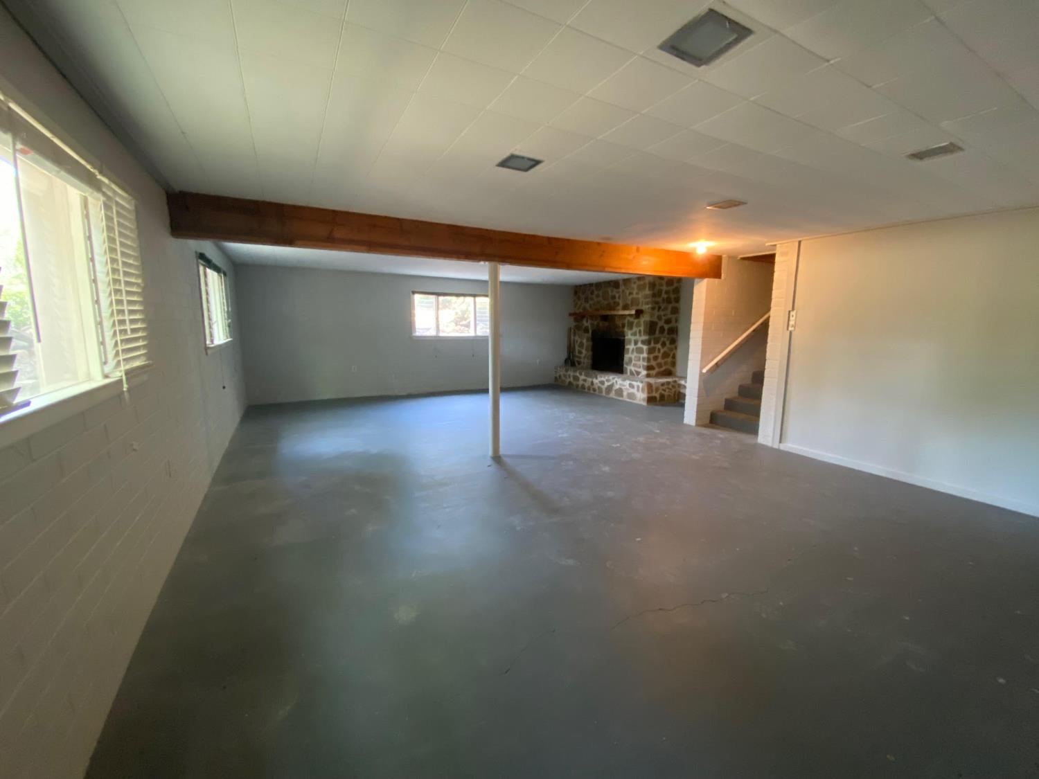1073 Shippee Lane Ojai, CA 93023 - Photo 14 of 28 an empty room with windows and fireplace