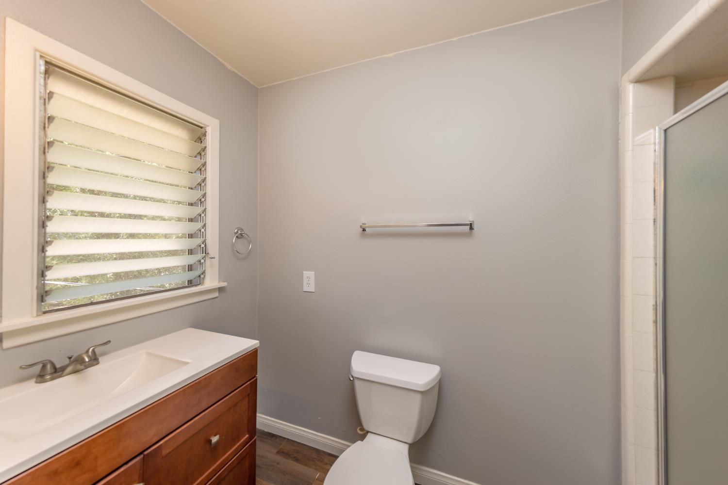 1073 Shippee Lane Ojai, CA 93023 - Photo 23 of 28 a bathroom with a sink a toilet and a window