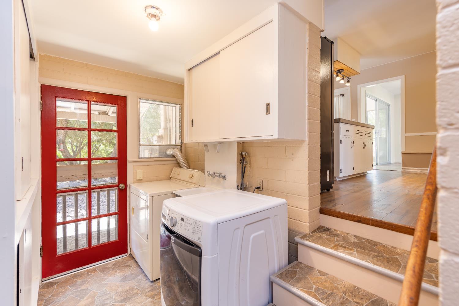 1073 Shippee Lane Ojai, CA 93023 - Photo 26 of 28 a utility room with cabinets washer and dryer