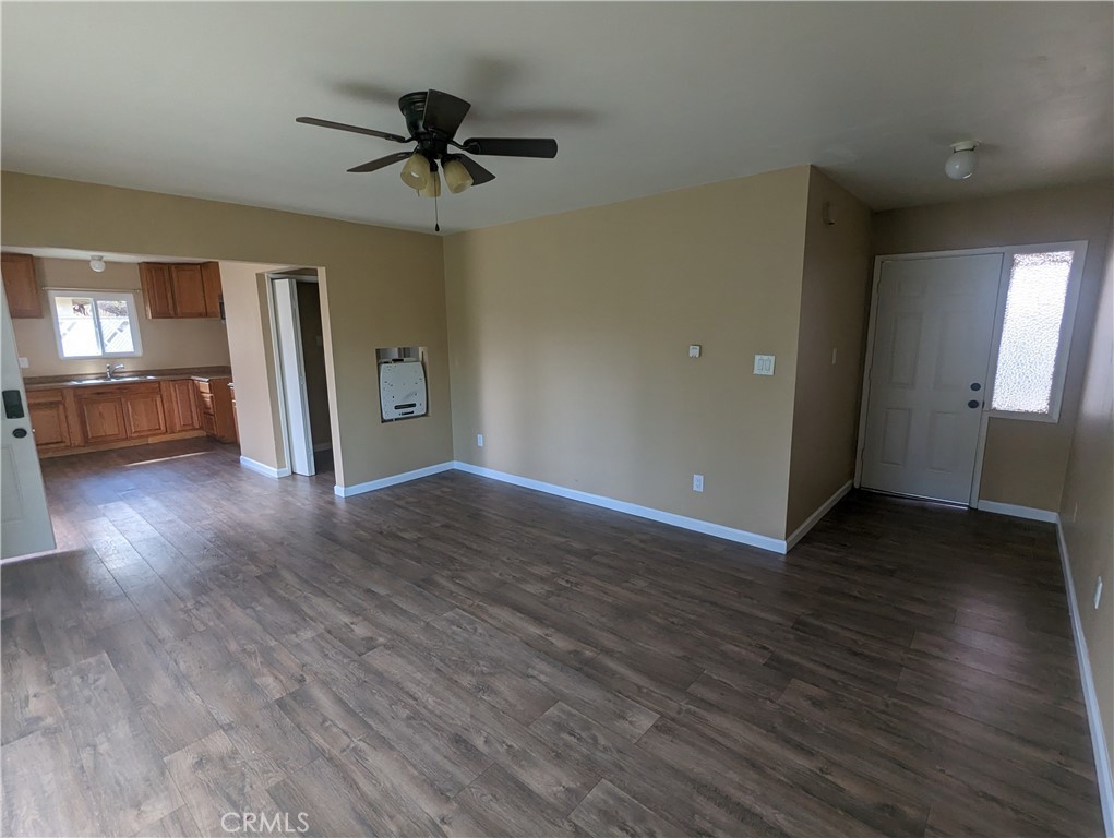 9330-9332 Saffron Court Riverside, CA 92503 - Photo 13 of 21 wooden floor in an empty room with a window
