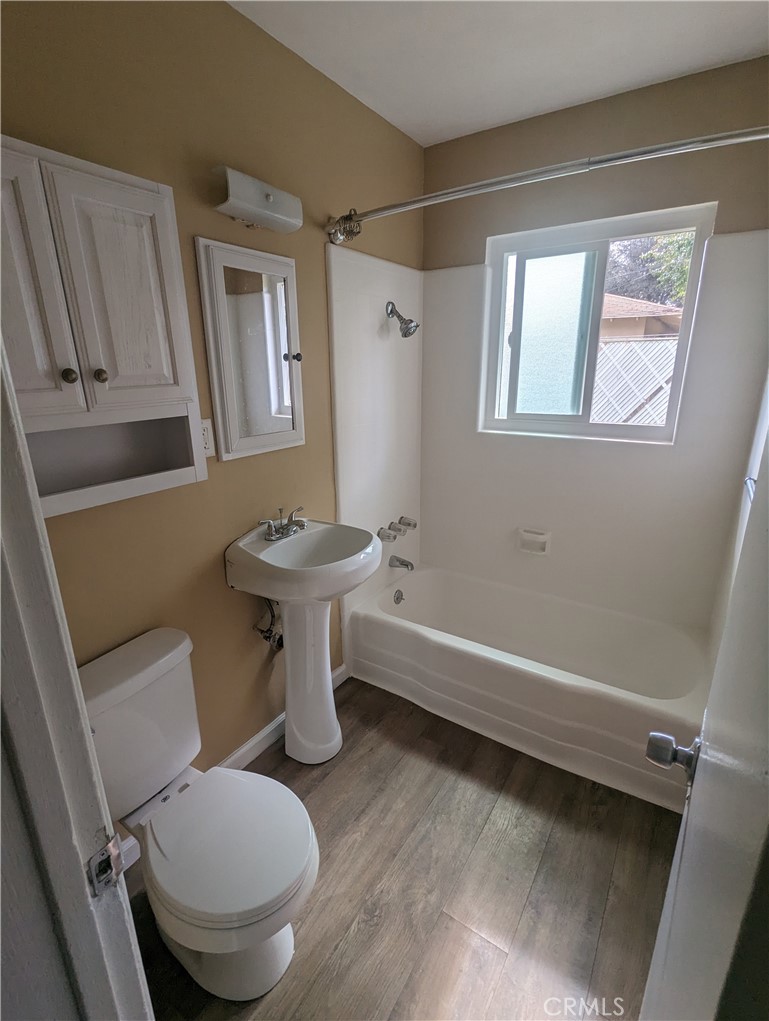 9330-9332 Saffron Court Riverside, CA 92503 - Photo 19 of 21 a bathroom with a sink toilet and shower