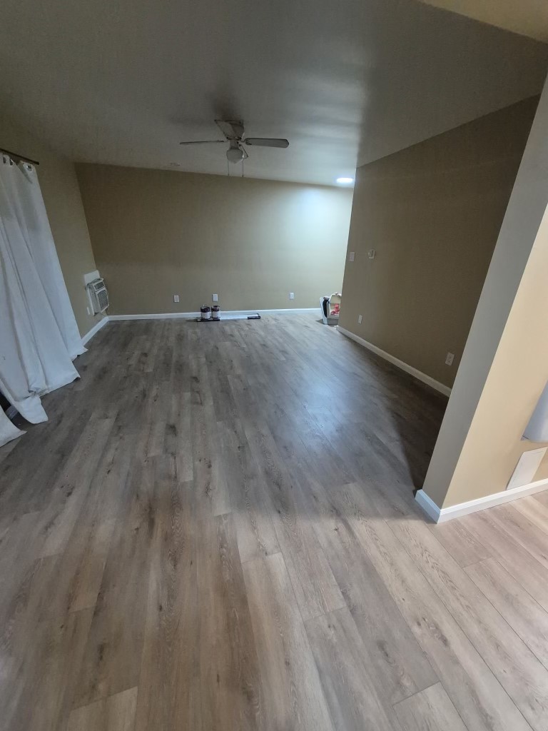 9330-9332 Saffron Court Riverside, CA 92503 - Photo 3 of 21 a view of a room with wooden floor