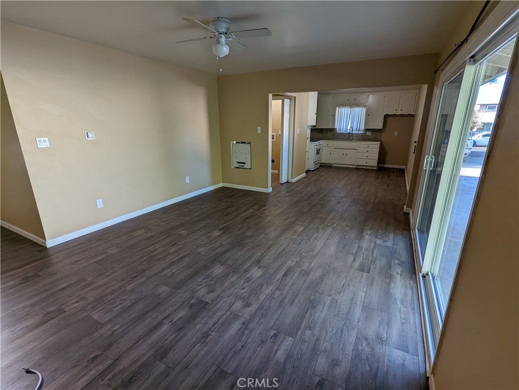 9330-9332 Saffron Court Riverside, CA 92503 - Photo 3 of 21 a view of a livingroom with wooden floor and furniture