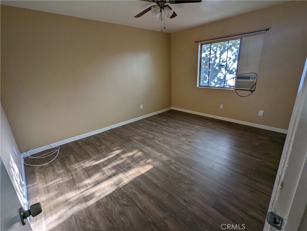9330-9332 Saffron Court Riverside, CA 92503 - Photo 6 of 21 a view of room with window and wooden floor