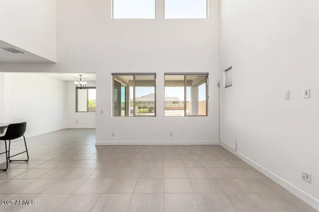 a spacious bathroom with a double vanity sink mirror and double