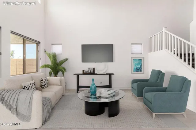 a kitchen with stainless steel appliances kitchen island granite countertop lots of white cabinets a stove and a window