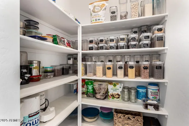 a view of a hallway with workspace