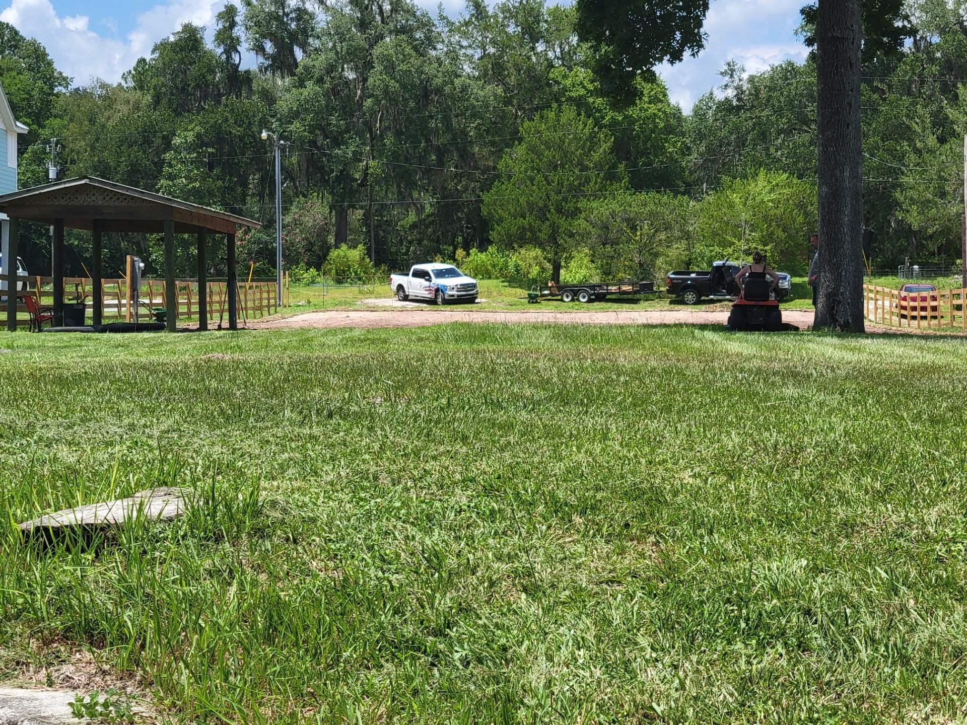 4057 Lazy Acres Road Middleburg, FL 32068 - Photo 15 of 15 a view of outdoor space with a garden and trees