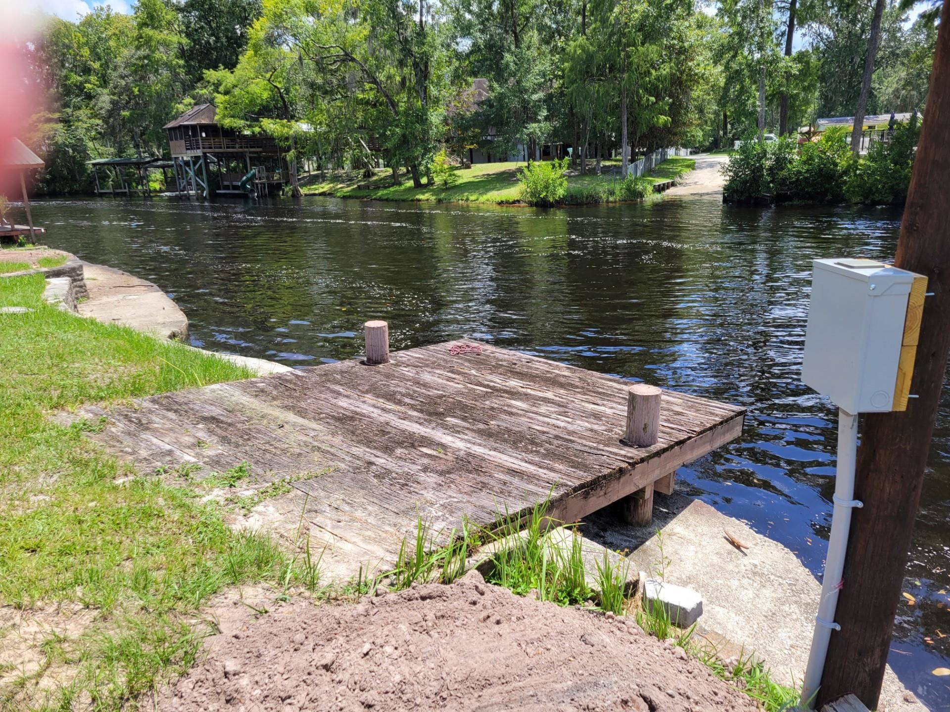 4057 Lazy Acres Road Middleburg, FL 32068 - Photo 9 of 15 a view of a lake with a wooden deck and a lake view