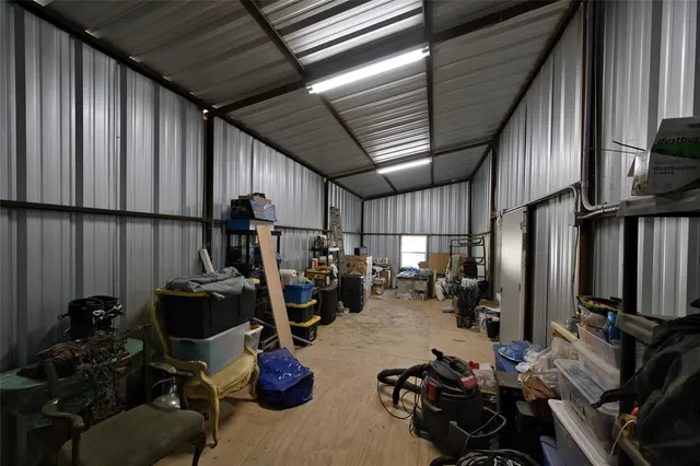 a room with gym equipment and equipment