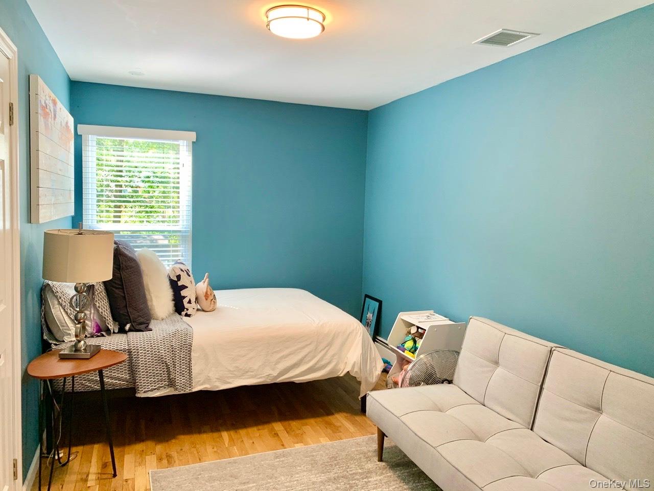 61 Kings Point Road East Hampton, NY 11937 - Photo 10 of 15 Bedroom with wood finished floors