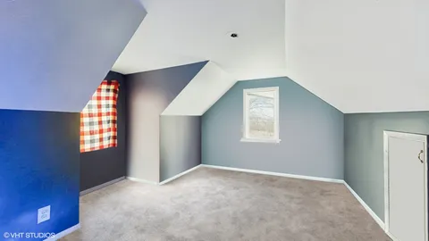 a room with toys and dresser