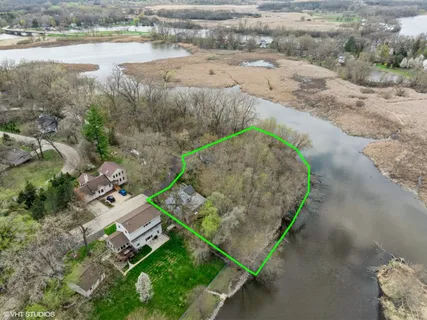 a picture of a bench in front of a wall