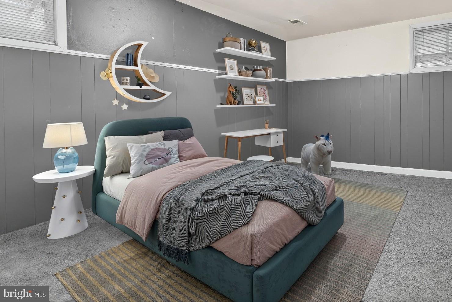 8906 Scheurer Street Lanham, MD 20706 - Photo 18 of 21 a bedroom with a bed and flowerpot