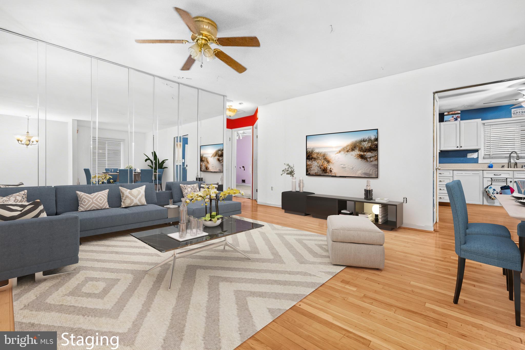 8906 Scheurer Street Lanham, MD 20706 - Photo 5 of 21 a living room with furniture or couch and a dining table