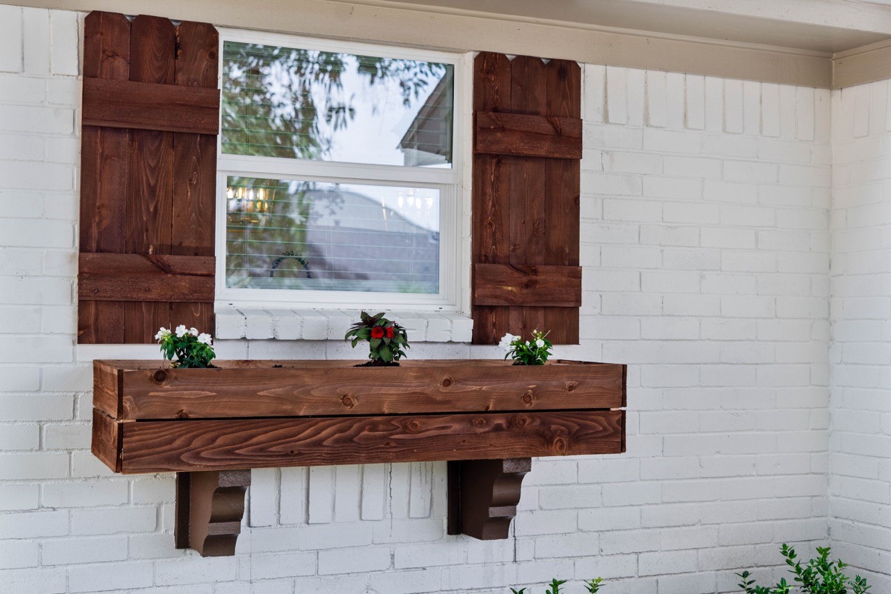 5326 Findlay Drive Pasadena, TX 77505 - Photo 4 of 50 Custom wood shutters and window box add charm and character.
