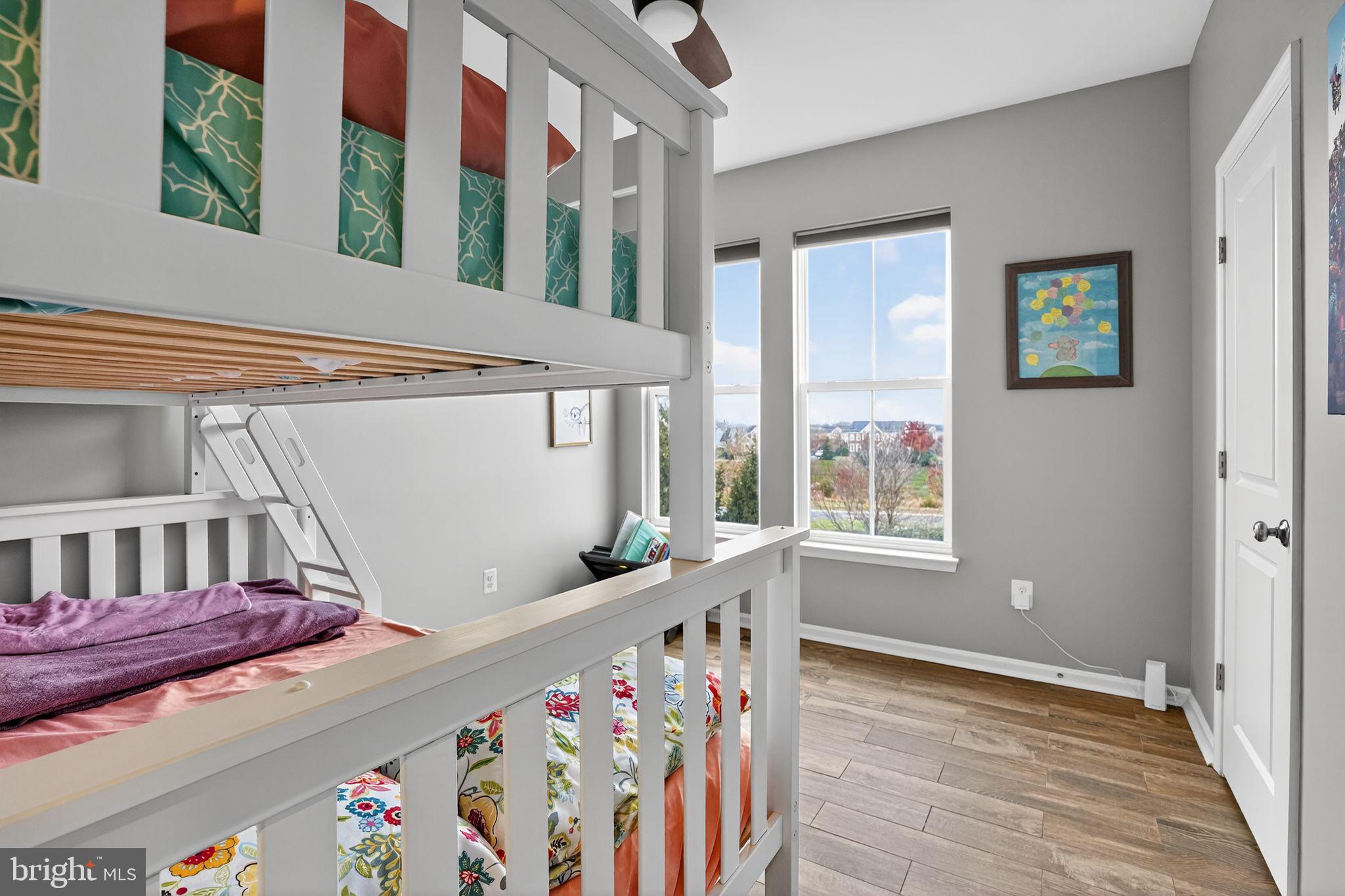 42239 Riggins Ridge Terrace Brambleton, VA 20148 - Photo 19 of 30 a bedroom with windows